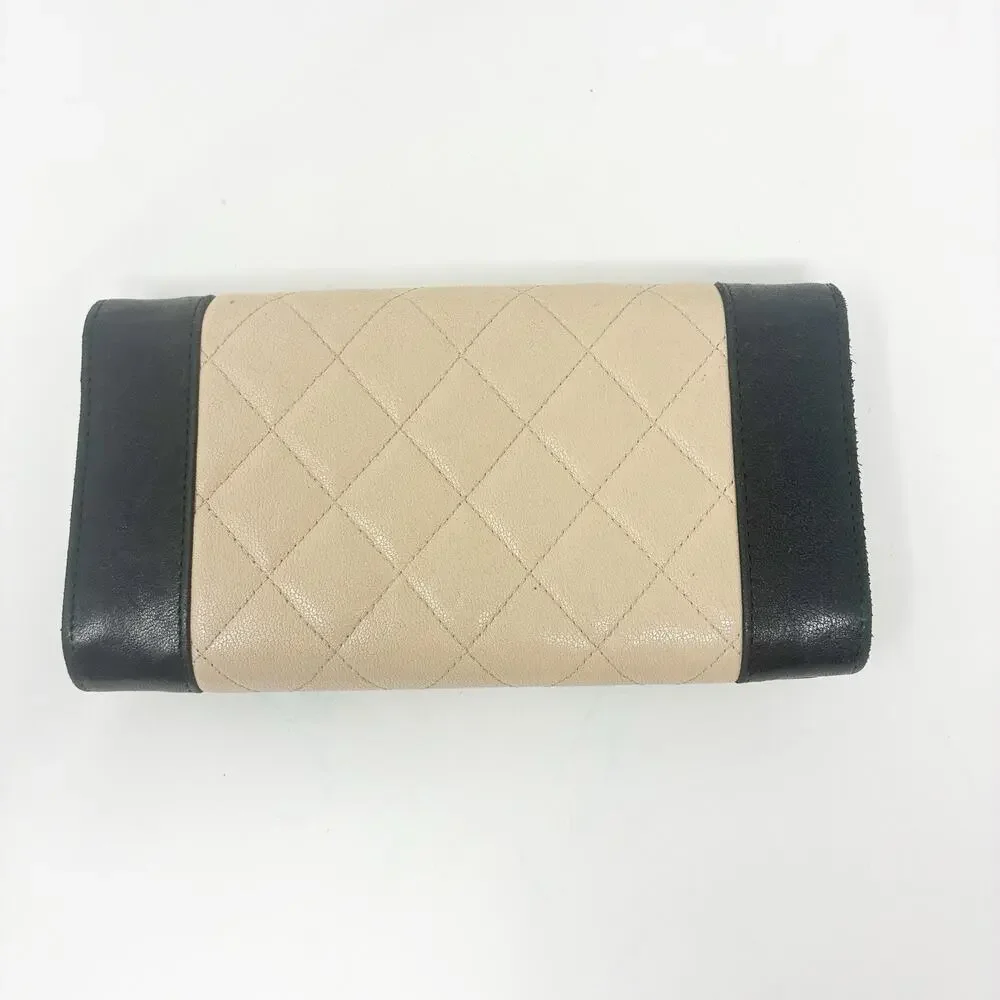 Chanel Mademoiselle Quilted Wallet in Black and Beige